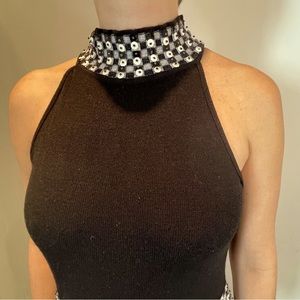 Tricot blouse with beautiful details stitched in the neck and bottom